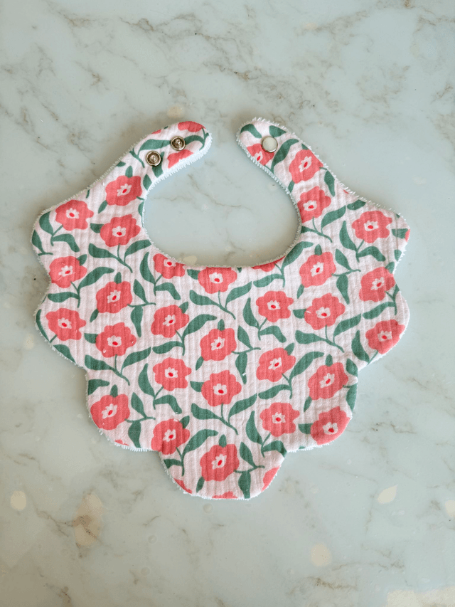 Bavoir fleur bébé fille (0-12 mois)