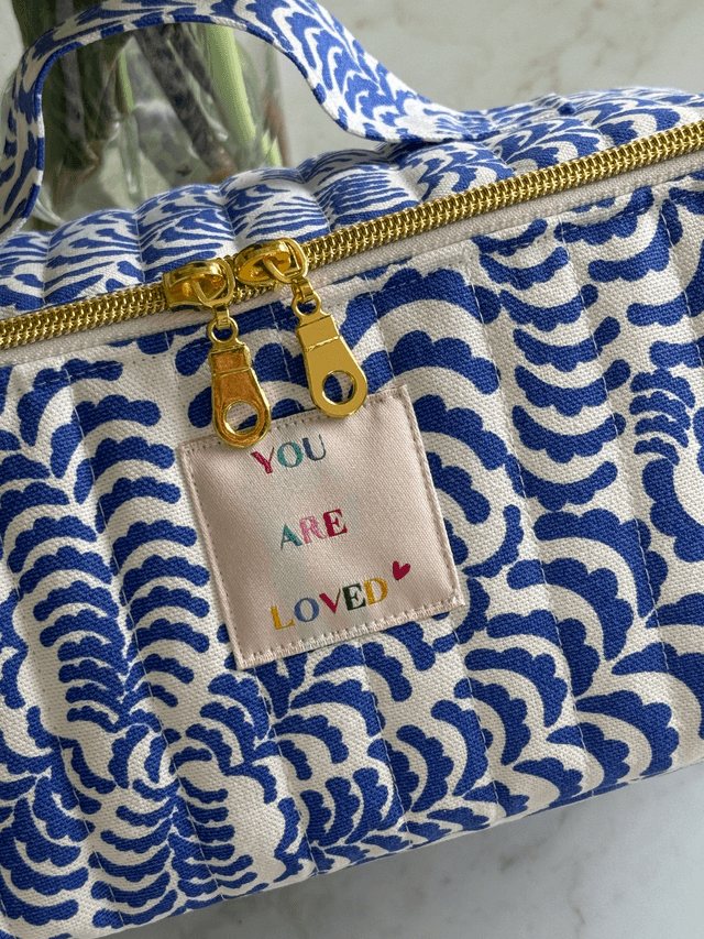 Trousse de toilette ouverture à plat